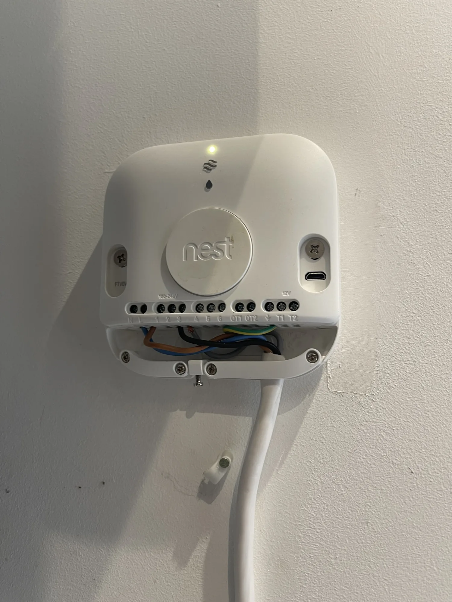 Nest smart thermostat backplate wired in during installation